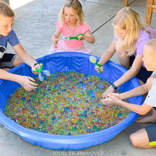 kids playing with jumbo water beads
